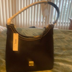 Dooney Bourne. Dark navy shoulder bag.  Red  lining.  New never used
